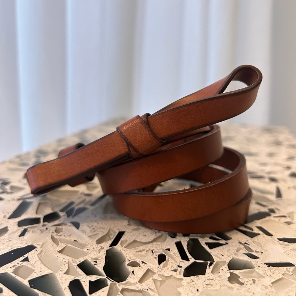 Brown leather belt with bow